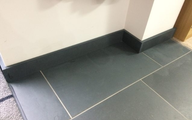 Tile skirting in bathroom.